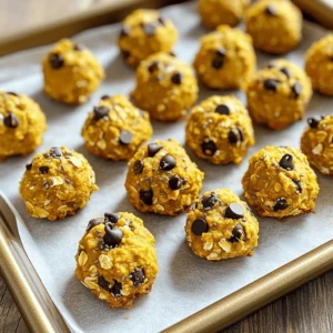 To make these tasty bites, you need: - 1 cup rolled oats - 1/2 cup canned pumpkin puree - 1/4 cup almond butter (or substitute with peanut butter) - 1/4 cup pure maple syrup - 1 teaspoon vanilla extract - 1/2 teaspoon ground cinnamon - 1/4 teaspoon ground nutmeg - 1/4 teaspoon fine sea salt - 1/2 cup chocolate chips (dark or semi-sweet) These ingredients create a delicious mix of flavors. The oats provide a hearty base. Pumpkin adds moisture and a lovely fall flavor. Almond butter gives a creamy texture, while maple syrup adds sweetness. The spices, cinnamon and nutmeg, bring warmth and depth. Finally, chocolate chips make every bite a treat. You can add 2 tablespoons of chia seeds for extra nutrition. Chia seeds are tiny but mighty. They boost fiber and protein in your bites. This addition makes the recipe even healthier without changing the taste. If you have allergies, there are some easy swaps: - Use sunflower seed butter if you're allergic to nuts. - Honey can replace maple syrup for sweetness. - Omit chocolate chips for a lower sugar option. Always check labels for allergens. This way, you keep your bites safe for everyone. Start with a large mixing bowl. Add 1 cup of rolled oats. Then, mix in 1/2 cup of canned pumpkin puree. Next, add 1/4 cup of almond butter or peanut butter. Pour in 1/4 cup of pure maple syrup. Use a spatula to mix everything until smooth. Make sure there are no lumps. Now, it’s time to add some flavor. Include 1 teaspoon of vanilla extract. Next, add 1/2 teaspoon of ground cinnamon and 1/4 teaspoon of ground nutmeg. Sprinkle in 1/4 teaspoon of fine sea salt. Stir well to combine. This will make your bites taste amazing. With clean hands, scoop the mixture. Roll each scoop into a ball about 1 inch in diameter. Place these balls on a parchment-lined baking tray. This step is fun! You’ll see how easy it is to shape your cookie dough bites. Once you finish rolling the bites, place the tray in the refrigerator. Let them chill for at least 30 minutes. This helps them firm up nicely. After chilling, transfer the bites to an airtight container. They can stay fresh in the fridge for up to a week. You can also freeze them for later! To get the perfect texture, use rolled oats. They give a nice chew. If you want a smoother bite, blend the oats first. Mixing in almond butter helps bind the dough. If you like crunch, add nuts or seeds. Chia seeds are a great option too. They add texture and nutrition. Store your cookie dough bites in an airtight container. This keeps them fresh for a week. If you want them to last longer, freeze them. Just place them in a freezer-safe bag. They stay tasty for up to three months. Let them thaw in the fridge before eating. Presentation matters! Serve the bites in a fun bowl or on a colorful platter. A sprinkle of cinnamon on top makes them look fancy. You can also add extra chocolate chips for a sweet touch. This makes them even more inviting to your guests. {{image_4}} You can easily change the taste of your No-Bake Pumpkin Oatmeal Cookie Dough Bites. Adding nuts gives you a nice crunch. Try chopped walnuts or pecans for a savory twist. Dried fruits like cranberries or raisins can add sweetness. You can also mix in seeds, like sunflower or pumpkin seeds, for extra texture. Each addition transforms the bites into something new and exciting. These bites can fit many diets. To make them gluten-free, use certified gluten-free oats. If you need a vegan option, make sure your chocolate chips are dairy-free. Swap out almond butter for sunflower seed butter to avoid nuts. This way, everyone can enjoy these tasty treats, no matter their dietary needs. You can adapt these bites for any holiday. For Halloween, add orange and black sprinkles or top them with candy corn. During Thanksgiving, sprinkle some chopped pecans and a drizzle of maple syrup on top. For Christmas, use peppermint extract instead of vanilla for a festive flavor. Each season gives you a chance to create something special with these bites. To keep your No-Bake Pumpkin Oatmeal Cookie Dough Bites fresh, store them in an airtight container. This helps keep moisture out and preserves flavor. Place the container in the refrigerator right after chilling. The bites will stay firm and tasty for your next snack. If you want to keep these bites longer, freezing is a great option. First, place the bites on a baking tray in a single layer. Freeze them for about an hour until they are solid. Then, transfer them to a freezer-safe bag or container. Make sure to remove as much air as possible. These bites can last up to three months in the freezer. In the fridge, your cookie dough bites will last up to a week. If you freeze them, you can enjoy them for about three months. Just remember to label your containers with the date. This way, you’ll know when to enjoy them. Yes, you can use fresh pumpkin. Just cook and puree it first. Fresh pumpkin can add a lovely flavor. Make sure it is smooth and not watery. This keeps your cookie dough bites from becoming too soggy. These bites last about a week in the fridge. Store them in an airtight container to keep them fresh. You can also freeze them for up to three months. Just remember to allow them to thaw before enjoying. Absolutely! These bites are fun and tasty for kids. They are packed with healthy ingredients. The chocolate chips make them even more appealing. Plus, they are easy to make together as a family. Yes, you can skip the nut butter. Try using sunflower seed butter or a seed-based spread. This keeps the texture nice and creamy. It also makes the bites nut-free, good for allergies. We explored how to make no-bake pumpkin oatmeal cookie dough bites. You learned about the main ingredients and some tasty options. I shared step-by-step instructions to guide you through the process. Tips showed how to perfect texture and serve well. We discussed fun variations for different diets and seasons. Lastly, you found storage tips for keeping these bites fresh. Enjoy creating these delicious treats at home! They're easy, tasty, and great for sharing.