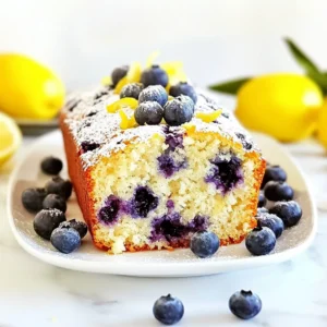 For a perfect Lemon Blueberry Yogurt Loaf, gather the following ingredients: - 1 cup all-purpose flour - 1 teaspoon baking powder - 1/2 teaspoon baking soda - 1/4 teaspoon salt - 1/2 cup plain yogurt (Greek or regular) - 1/2 cup granulated sugar - 1/4 cup vegetable oil - 2 large eggs, at room temperature - Zest of 1 lemon (about 1 tablespoon) - 2 tablespoons freshly squeezed lemon juice - 1 cup fresh blueberries (or thawed frozen blueberries) - 1/4 teaspoon vanilla extract If you need to substitute, here are some great options: - You can use almond flour instead of all-purpose flour for a gluten-free option. - Greek yogurt can replace regular yogurt for a thicker texture. - Unsweetened applesauce can work as a substitute for oil. - You can try honey or maple syrup instead of granulated sugar. These swaps can change the flavor or texture of the loaf, so it&rsquo;s worth experimenting! {{ingredient_image_2}} Start by preheating your oven to 350&deg;F (175&deg;C). Preheating the oven is key. It helps the loaf bake evenly. While the oven warms up, take a 9x5-inch loaf pan. Grease it well with cooking spray or butter. This step makes sure the loaf comes out easily after baking. In a medium bowl, measure 1 cup of all-purpose flour. Add 1 teaspoon of baking powder, 1/2 teaspoon of baking soda, and 1/4 teaspoon of salt. Use a whisk to mix these dry ingredients well. Whisking is important. It helps to break up any lumps and evenly mix the leavening agents. Grab a large mixing bowl. Add 1/2 cup of plain yogurt and 1/2 cup of granulated sugar. Use a whisk to blend them until smooth. Next, pour in 1/4 cup of vegetable oil, add 2 large eggs, the zest of 1 lemon, 2 tablespoons of lemon juice, and 1/4 teaspoon of vanilla extract. Whisk all these wet ingredients together until creamy. This mixture should be smooth and well-combined. Now, take the dry mixture and add it to the wet ingredients. Do this in parts, stirring gently with a spatula. Mix until just combined. Be careful not to overmix. This keeps the loaf light and fluffy. Now, gently fold in 1 cup of fresh blueberries. Use a spatula to ensure they are spread throughout the batter without breaking. Pour the batter into your greased loaf pan. Use a spatula to smooth the top. Bake in your preheated oven for 50-60 minutes. To check if it&rsquo;s done, insert a toothpick in the center. If it comes out clean or with a few moist crumbs, your loaf is ready. When the loaf bakes, remove it from the oven. Let it cool in the pan for about 10 minutes. Then, carefully transfer the loaf to a wire rack. Allow it to cool completely before slicing. This helps keep the texture just right. To make a perfect Lemon Blueberry Yogurt Loaf, avoid common baking mistakes. First, always measure your flour correctly. Too much flour can make your loaf dry. Use a spoon to scoop flour into your measuring cup, then level it off with a knife. Next, mix dry ingredients well. Whisk the flour, baking powder, baking soda, and salt together. This helps create an even rise. When combining wet and dry mixes, stir gently. Overmixing can lead to a tough loaf. Check your oven temperature. An oven that's too hot can burn the edges. An oven thermometer helps ensure the right heat. Bake until a toothpick comes out clean. This means your loaf is done. For serving, slice the loaf and place the pieces on a nice plate. You can dust them lightly with powdered sugar to add a sweet touch. Garnish with whole blueberries and lemon zest. This makes your loaf look fresh and colorful. Pair your Lemon Blueberry Yogurt Loaf with drinks like tea or lemonade. The tangy flavor complements the loaf's sweetness well. Consider serving it with a dollop of whipped cream or yogurt for extra creaminess. This adds a lovely finish to your dish. Pro Tips Fresh Blueberries: Use fresh blueberries for the best flavor and texture. If using frozen, make sure to thaw and drain them well to prevent excess moisture in the batter. Room Temperature Eggs: Ensure your eggs are at room temperature before mixing them in. This helps create a smooth batter and better incorporation with the other ingredients. Don't Overmix: Mix the batter until just combined. Overmixing can lead to a dense loaf, so be gentle when folding in the dry ingredients and blueberries. Cooling Time: Allow the loaf to cool completely on a wire rack before slicing. This helps set the texture and makes for cleaner, more even slices. {{image_4}} You can easily change the yogurt in this recipe. Try using Greek yogurt for a thicker texture. If you like a creamier loaf, use whole milk yogurt. Low-fat yogurt works too, but it might change the taste slightly. Instead of granulated sugar, use honey or maple syrup. These will add a unique flavor and sweetness. You can also swap the vegetable oil for melted coconut oil or butter for a richer taste. If you want to mix things up, add different fruits. Chopped strawberries or raspberries pair well with lemon. You might also try peaches or cherries for a summer twist. To enhance the flavor, consider adding spices. A pinch of cinnamon or nutmeg can bring warmth. Cardamom can add a lovely floral note. Just remember, a little goes a long way! For a gluten-free loaf, use a gluten-free flour blend. Make sure it has a mix of starches and proteins for the best texture. You can also add a bit of xanthan gum to help with the rise. If you need a vegan option, replace the eggs with flaxseed meal. Mix 1 tablespoon of flaxseed with 3 tablespoons of water. Let it sit for about five minutes to thicken. You can also use a plant-based yogurt for a creamy texture. To keep your Lemon Blueberry Yogurt Loaf fresh, wrap it tightly in plastic wrap. Place it in an airtight container or a zip-top bag. This helps keep the moisture in and prevents it from drying out. Store it at room temperature for short-term use. If you want to keep it longer, move it to the fridge. Just make sure it&rsquo;s well wrapped. If you want to freeze the loaf, first cool it completely. Then, slice it into individual pieces. Wrap each slice in plastic wrap and place them in a freezer-safe bag. This way, you can take out only what you need. To thaw, simply place a slice in the fridge overnight or leave it at room temperature for a few hours. You can also warm it in the microwave for a quick treat. At room temperature, the loaf lasts about 2 to 3 days. In the fridge, it stays fresh for about a week. If you freeze it, the loaf can last up to 3 months. Just remember to check for any signs of freezer burn before enjoying it. This way, you'll always have a slice of lemon blueberry goodness ready to go! You can use sour cream in place of yogurt. It gives a similar tangy taste. Buttermilk is another good choice. It will add moisture to the loaf. If you want a dairy-free option, try using coconut yogurt. Make sure it is plain and unsweetened for the best results. Yes, you can use frozen blueberries. Just remember to thaw them first. Drain any excess juice to avoid a wet batter. Frozen blueberries may not hold their shape as well in the loaf. However, they still add great flavor and color. Check the loaf after 50 minutes. Insert a toothpick into the center. If it comes out clean with a few crumbs, the loaf is ready. If the toothpick has wet batter, bake for a few more minutes. The top should also be golden brown. Yes, you can double the recipe easily. Just use a larger mixing bowl and pan. A 9x5-inch pan works for one loaf, but use two for the doubled batch. You may need to add a few extra minutes to the baking time. Keep an eye on the loaf as it bakes. In this post, I shared a detailed guide for making a delicious blueberry loaf. We covered ingredients, step-by-step baking instructions, tips for success, and variations. Remember, preheating your oven is key, and proper mixing is crucial for a smooth batter. Try different ingredients to make it your own, and follow my storage tips to keep it fresh. Baking is fun and allows for creativity. Enjoy baking and tasting your blueberry loaf! You&rsquo;ll impress everyone with your skills.